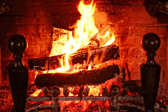 Warm and inviting fire in fireplace